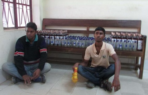 Police seized foreign liquors: Detained two youths: Liquors being taken from Kailasahar